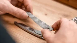 Taschenmesser Volldamast goldfarbig